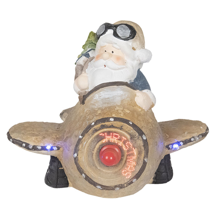 Kerstman in vliegtuig met bewegende rotor en lichtjes